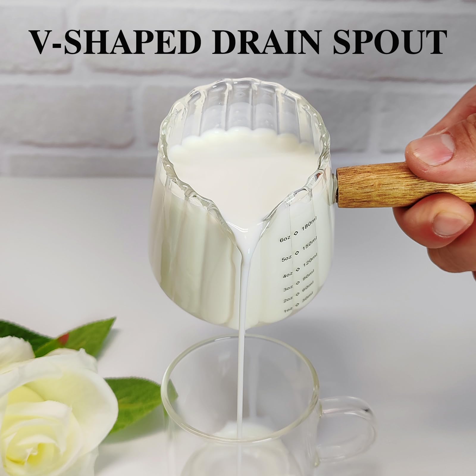 TIWPAJS glass measuring cup for precise pour measurements.