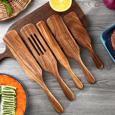 Smooth teak surface protects non-stick pans