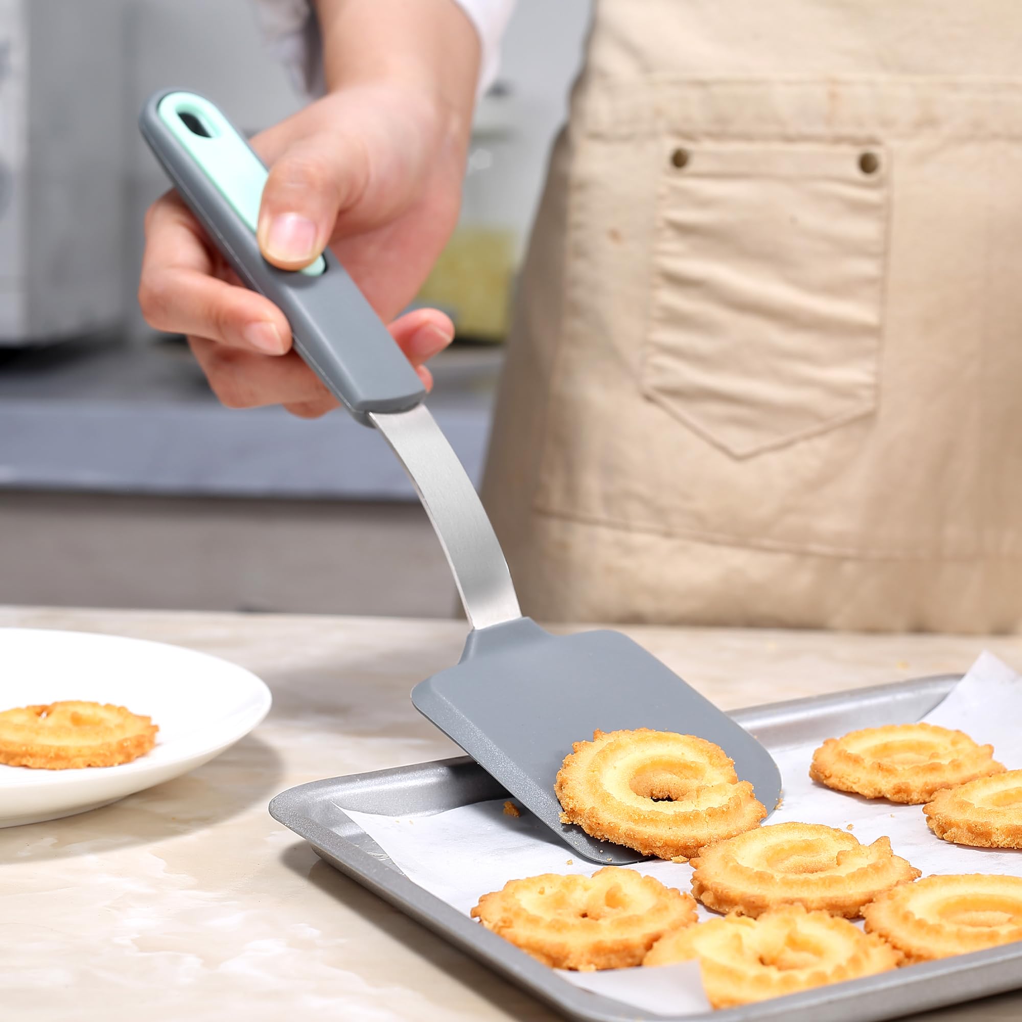 To Encounter turner spatula slides cleanly under eggs and pancakes.