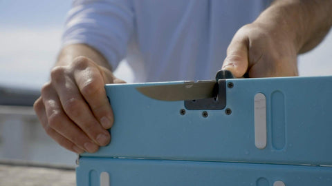 Toadfish Stowaway Cutting Board magnetic closure enables quick, secure setup.