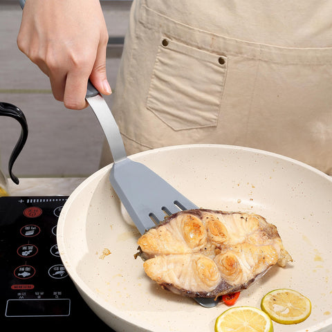 To Encounter pancake spatula helping slide batter smoothly from pan