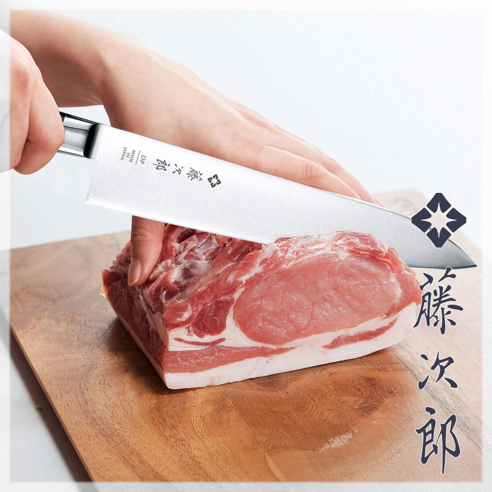 Tojiro Japan chef knife handle front view shows a balanced grip.