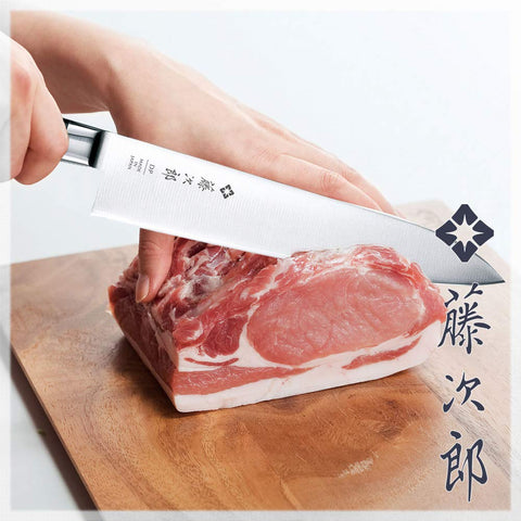 Tojiro Japan chef knife handle front view shows a balanced grip.