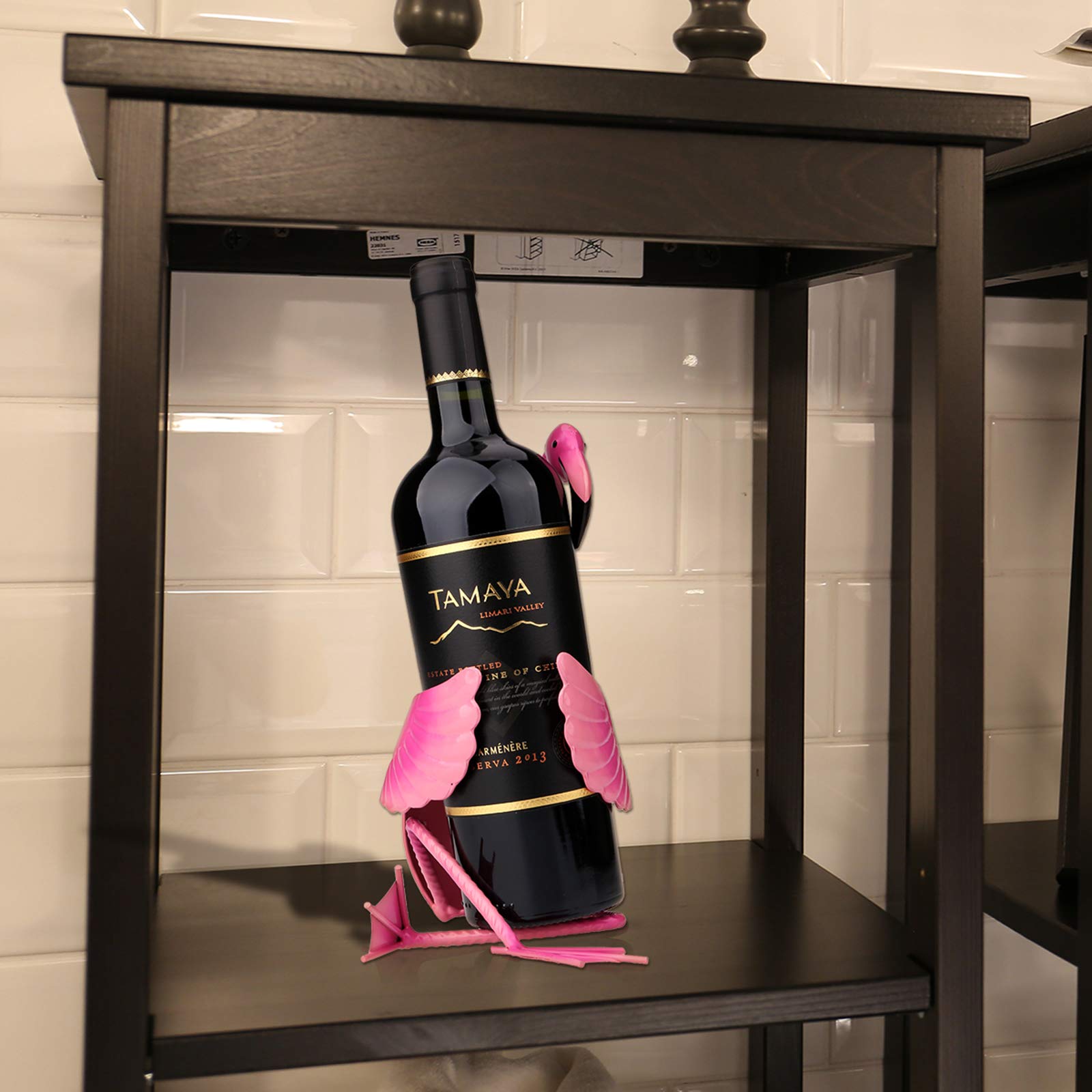 Tooarts Flamingo Wine Holder in dining room enhances table presentation with flair.