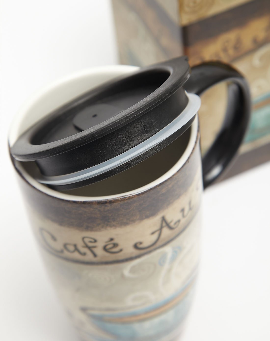 Topadorn travel mug with ergonomic handle for easy grip on hot or cold drinks.
