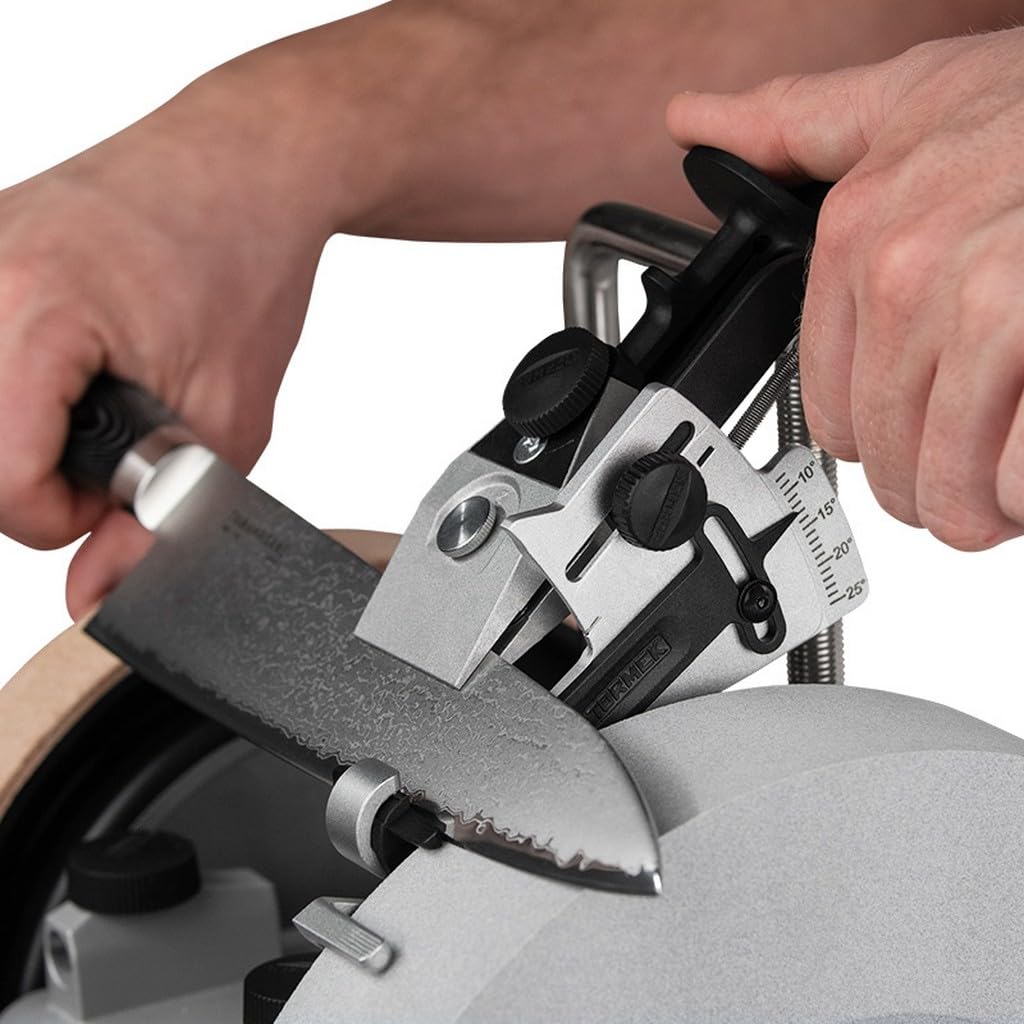 Tormek KS-123 adjustment in action with knives on sharpening wheel.