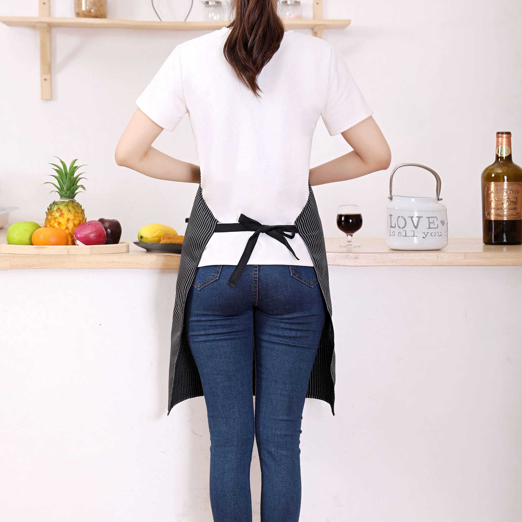 Long waist ties on a Tosewever bib apron for versatile tying options