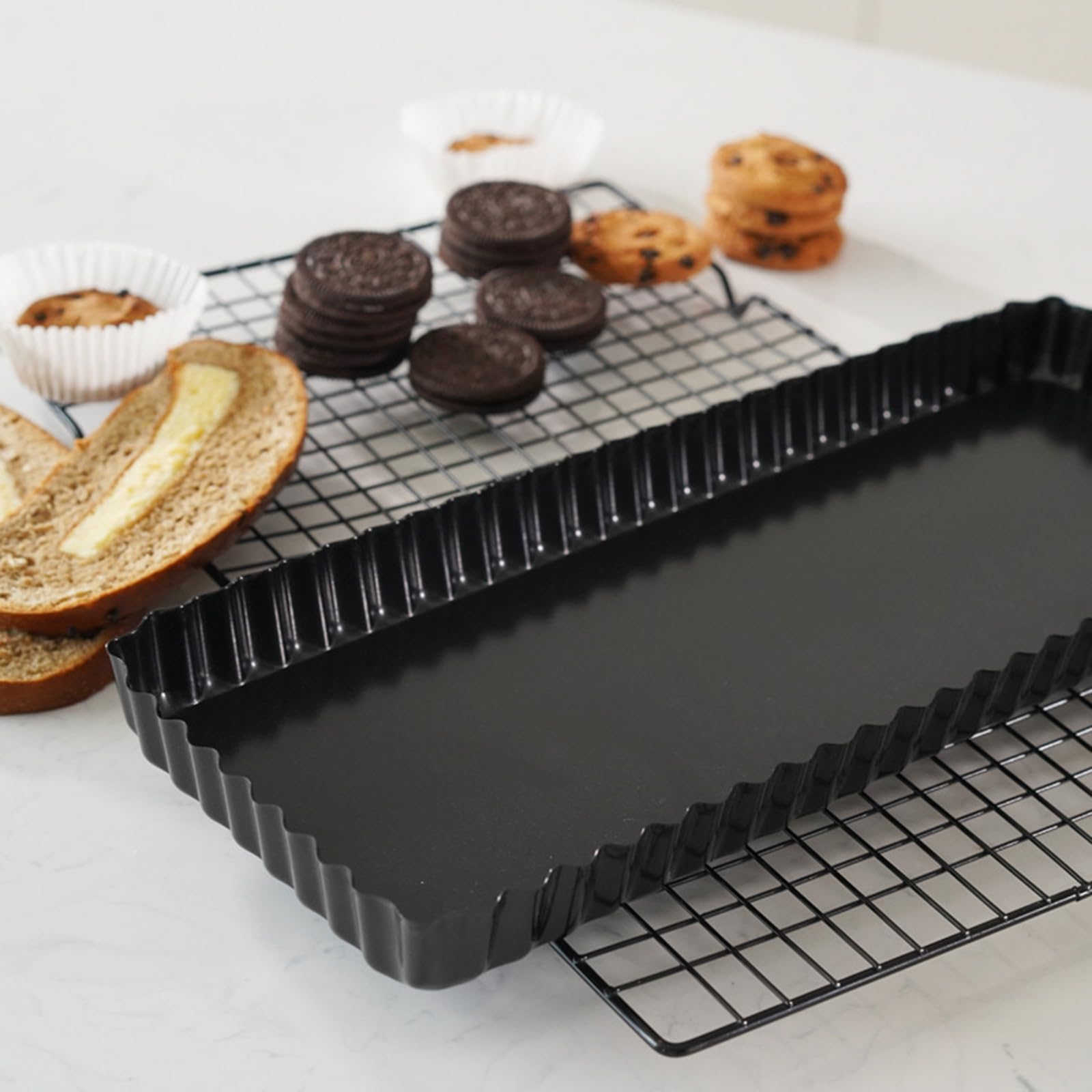 Tosnail quiche pan ideal for party and family dinner prep.
