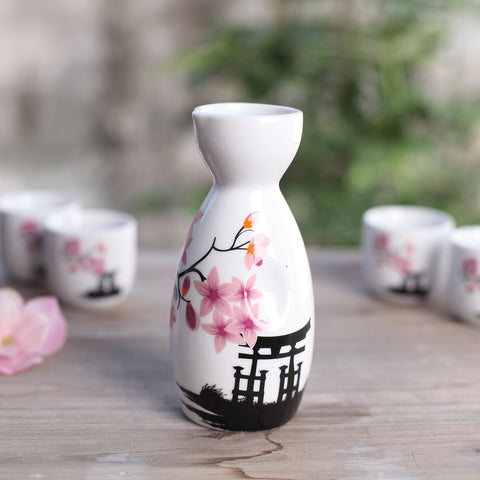 Tosnail sake set unboxing scene in a cozy home setting