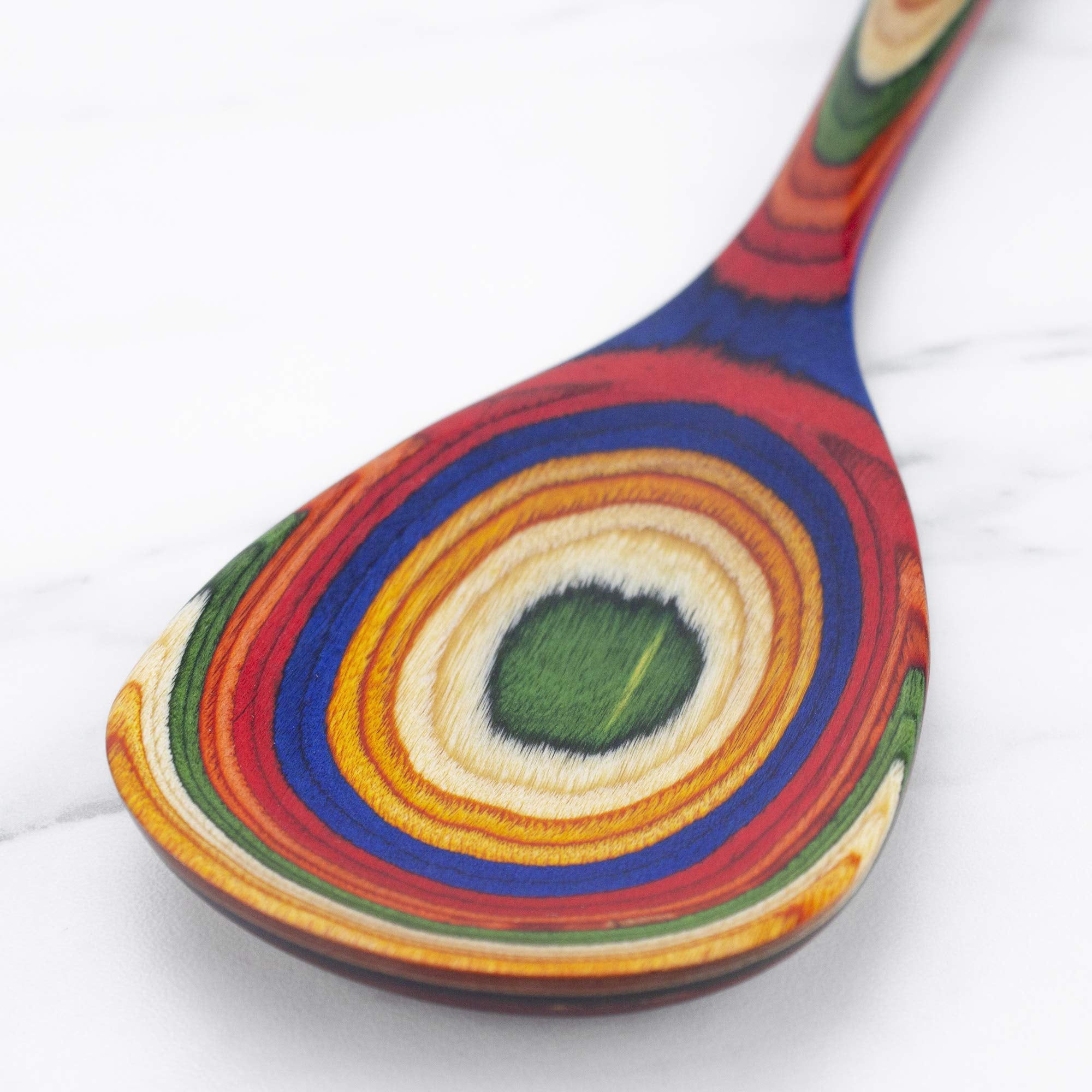 Totally Bamboo Baltique Marrakesh spoon in nonstick pan, safe for delicate coatings.