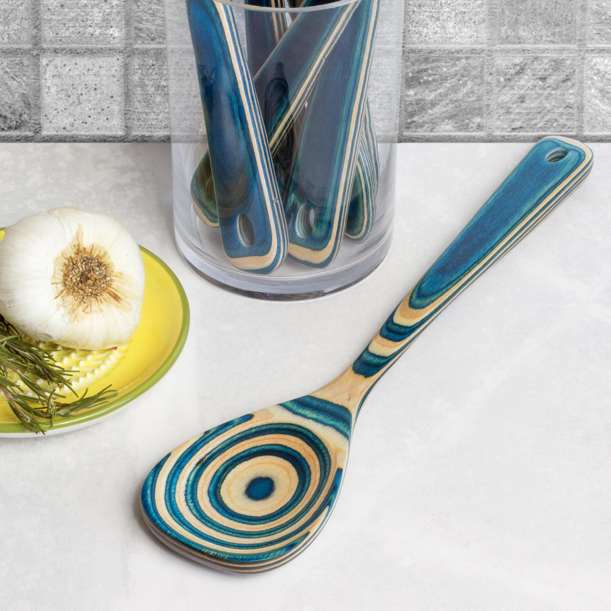 Nonstick-safe Baltique Mykonos spoon glides without scratching pans.