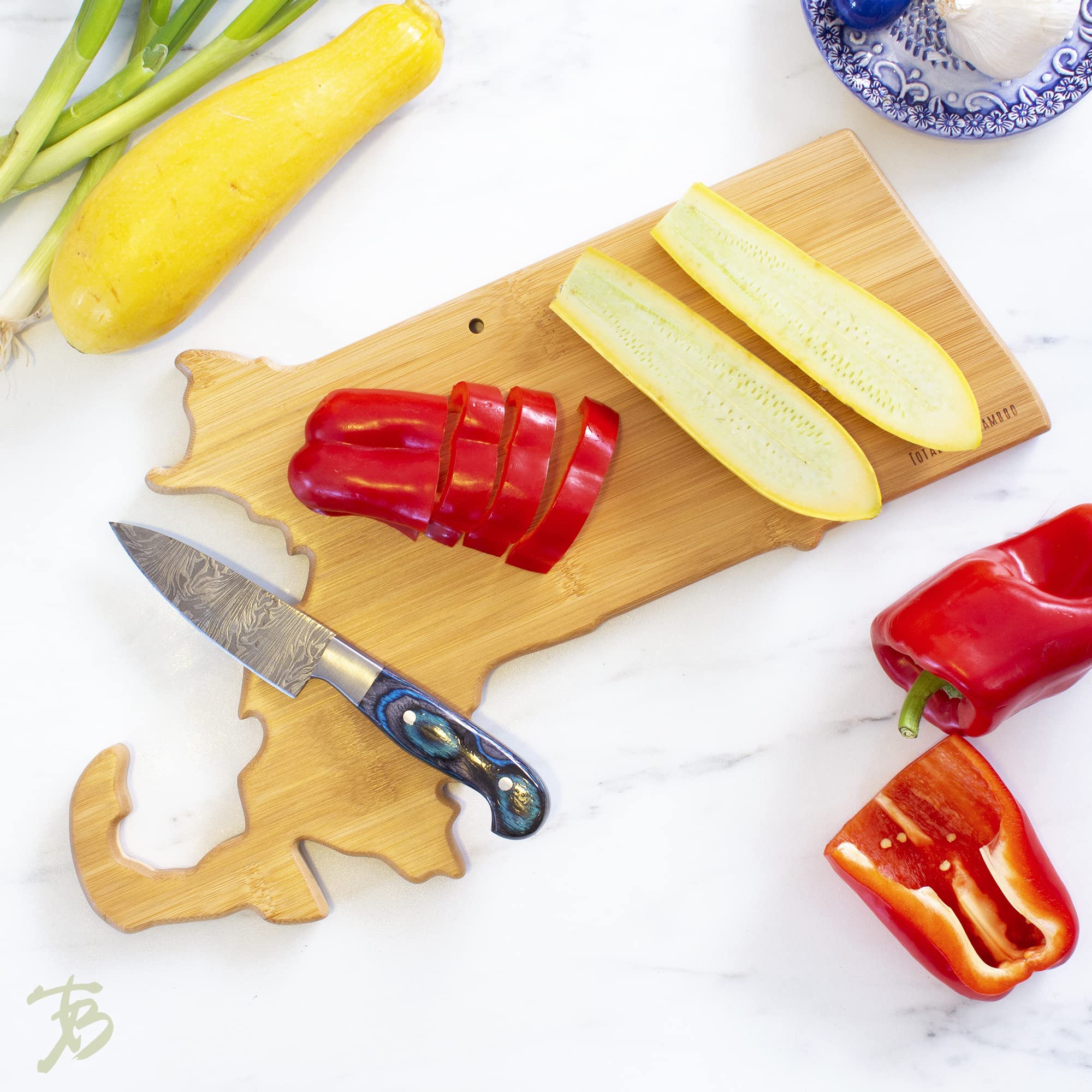 Totally Bamboo cutting and serving board for versatile kitchen use.