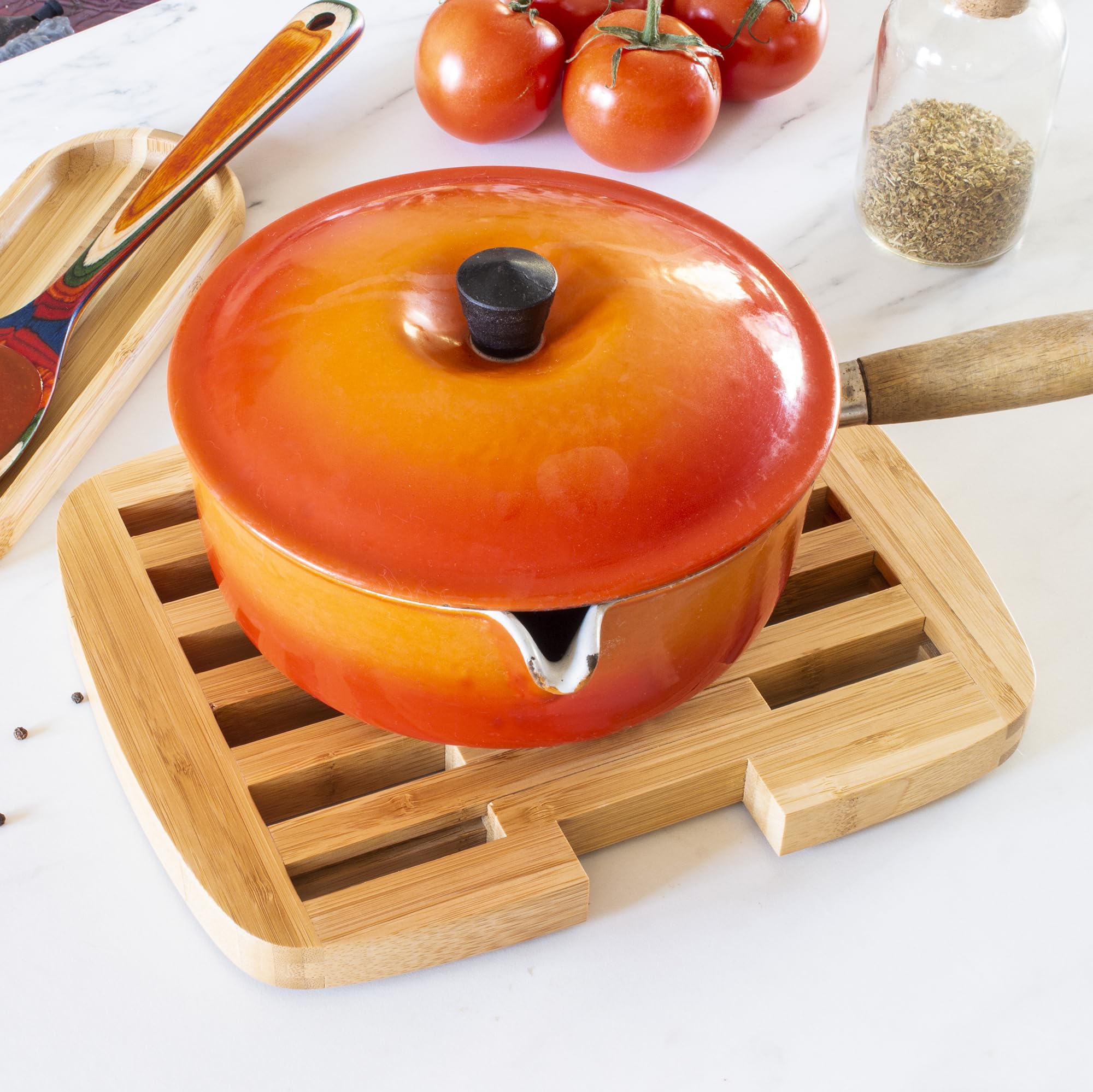 Totally Bamboo Expandable Trivet expanded mode provides larger protection for large dishes.