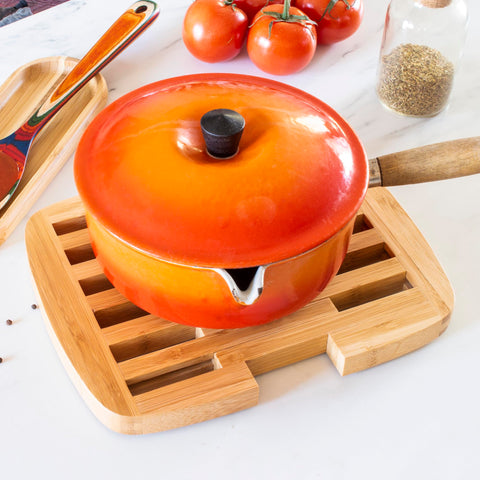 Totally Bamboo Expandable Trivet expanded mode provides larger protection for large dishes.