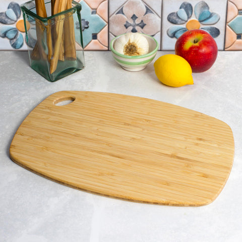 Totally Bamboo Greelite reversible cutting board showing two usable sides.