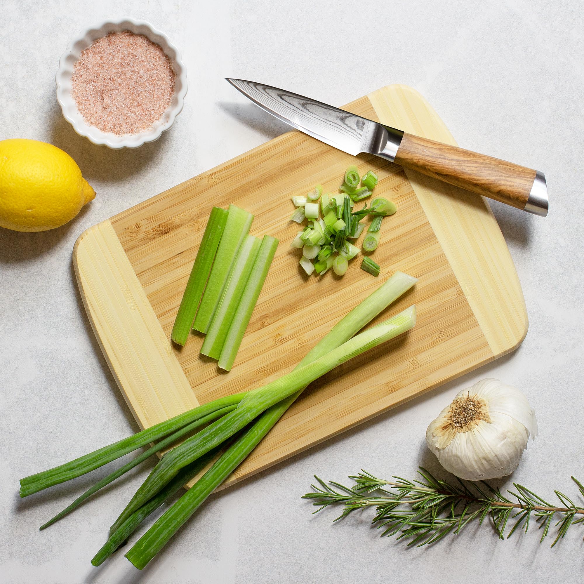 Hana board two-tone design highlights mid-century style and gentle knife contact