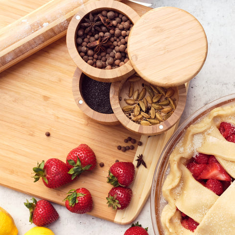 Totally Bamboo Kauai Cutting Board knife-friendly surface protects blades during slicing.
