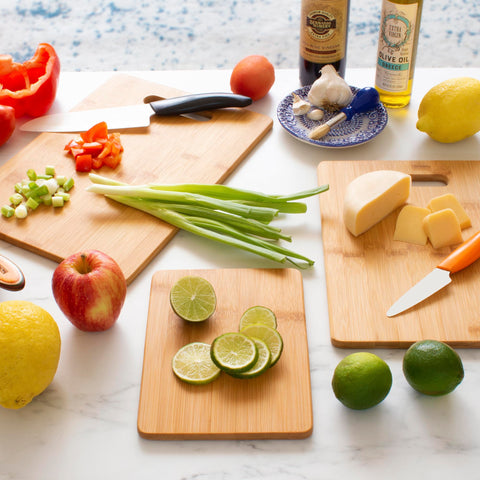 Totally Bamboo knife-friendly cutting board protects blades while chopping.