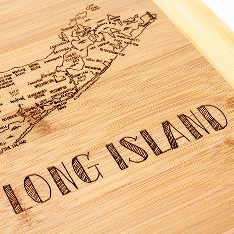 Totally Bamboo reversible cutting board provides knife-friendly surface for easy prep and serving