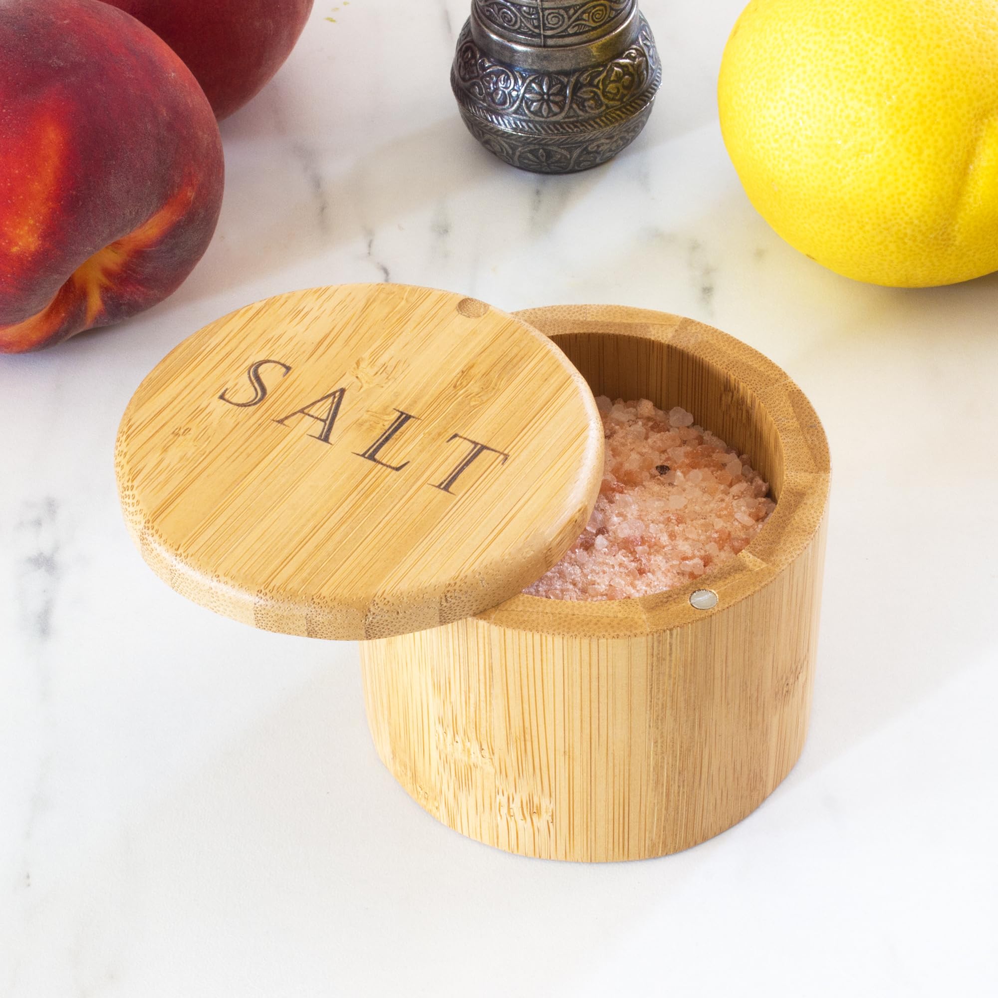 Swivel lid opens with one hand for fast seasoning