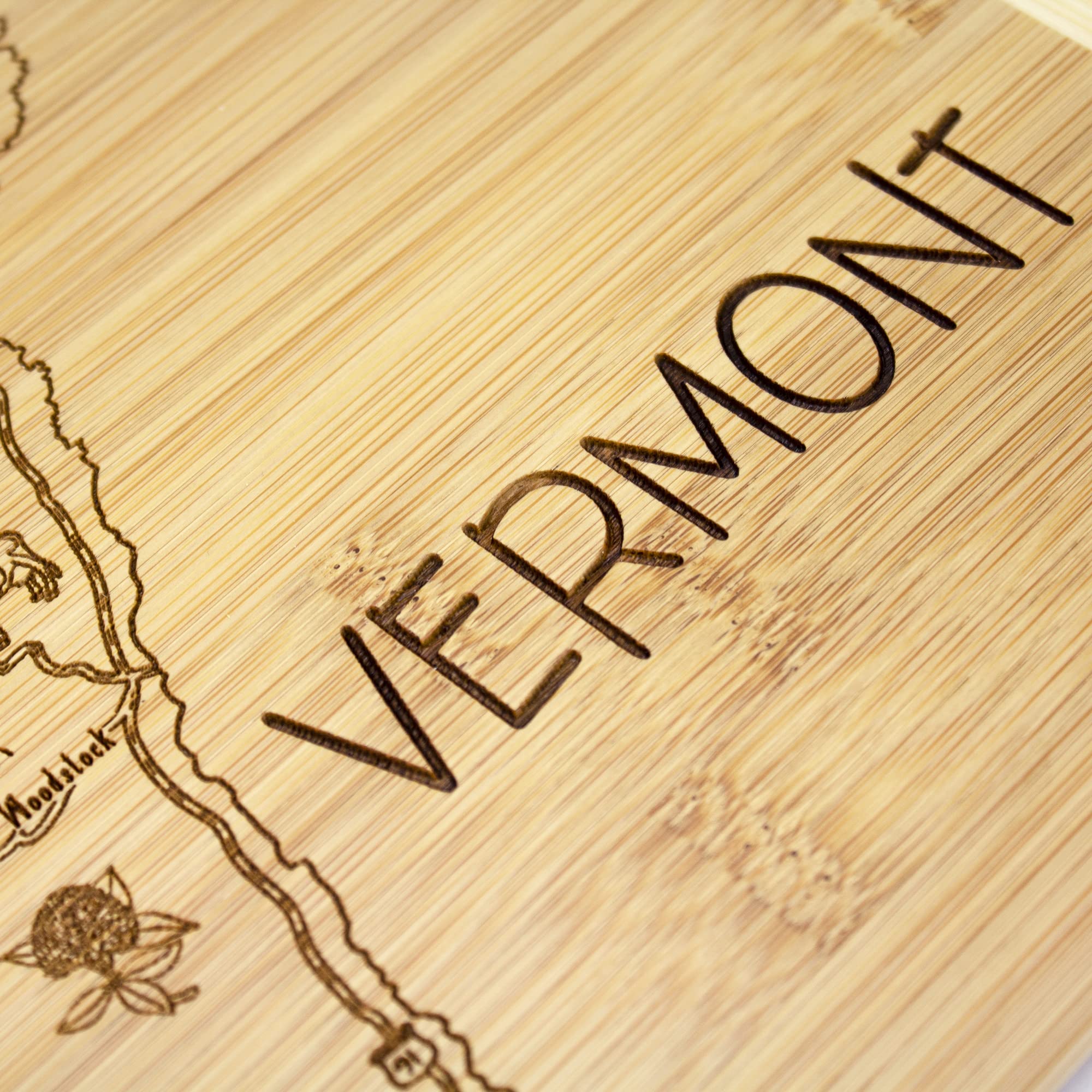 Totally Bamboo Vermont serving board closeup, smooth surface for easy slicing and serving.