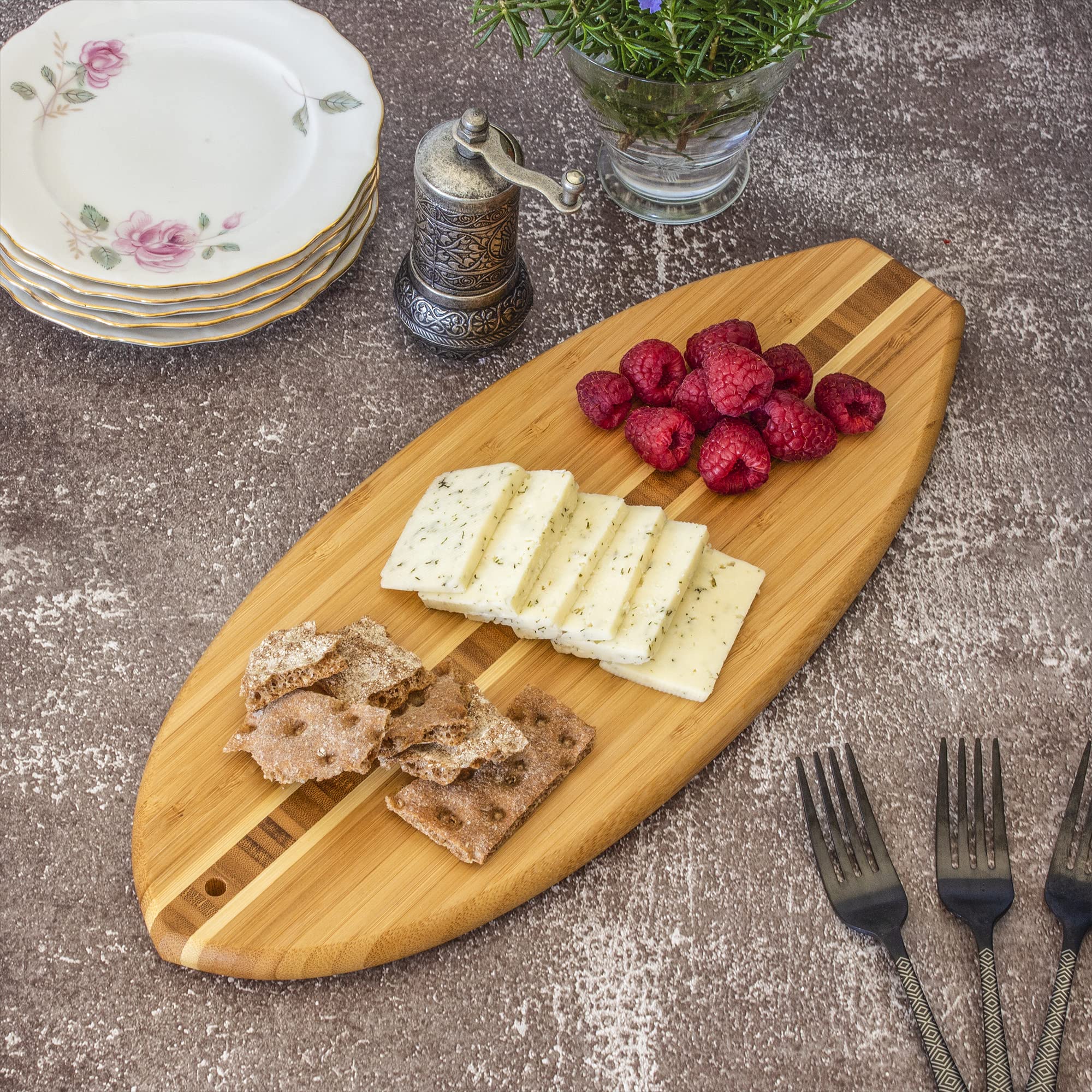 Vertical-grain bamboo provides a lightweight, knife-friendly cutting surface.