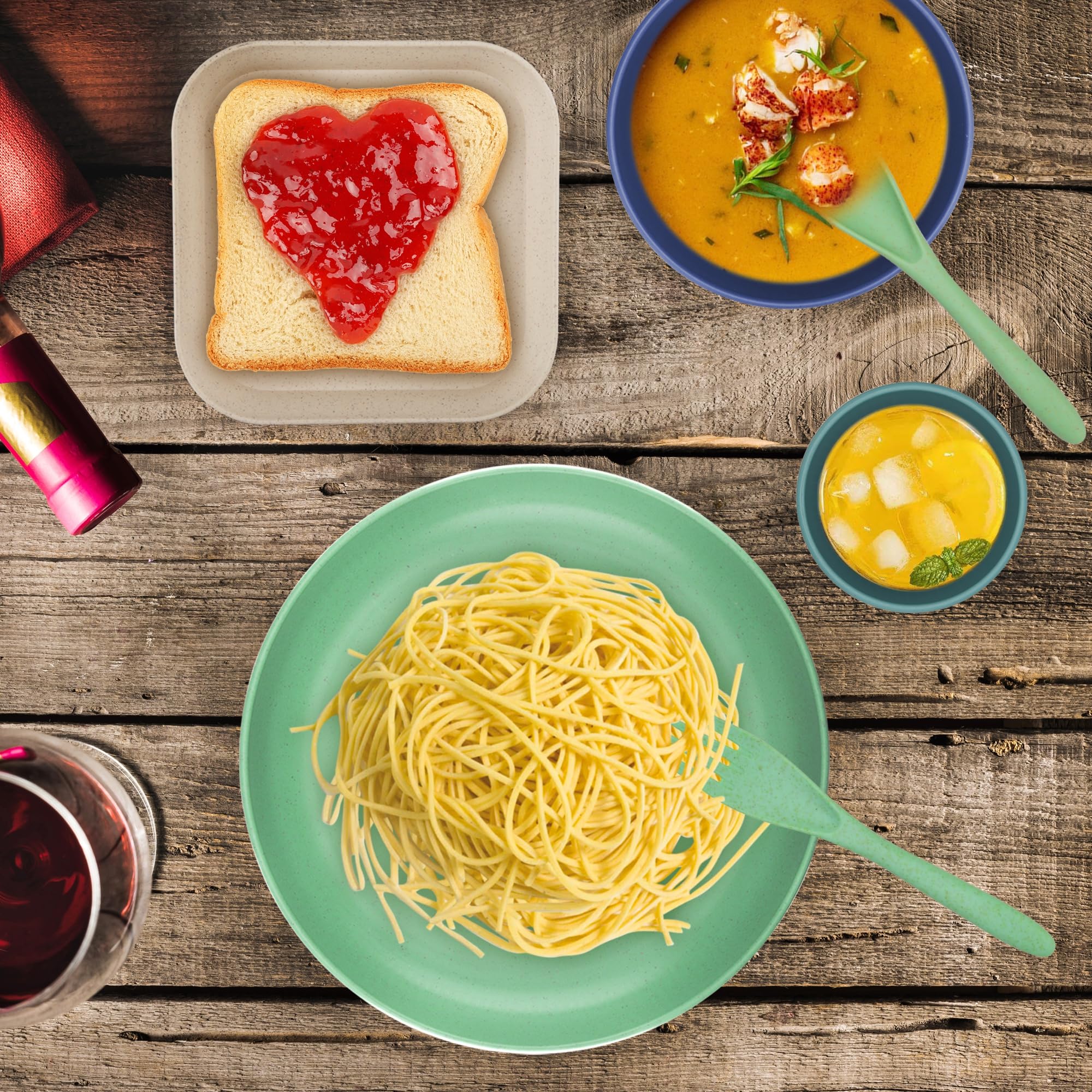 TOUWMX unbreakable-dishware design shown with neatly stacked plates and bowls.