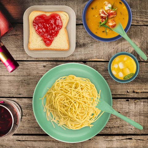 TOUWMX unbreakable-dishware design shown with neatly stacked plates and bowls.