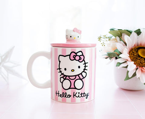 Toynk Hello Kitty desk mug keeps beverages within reach.