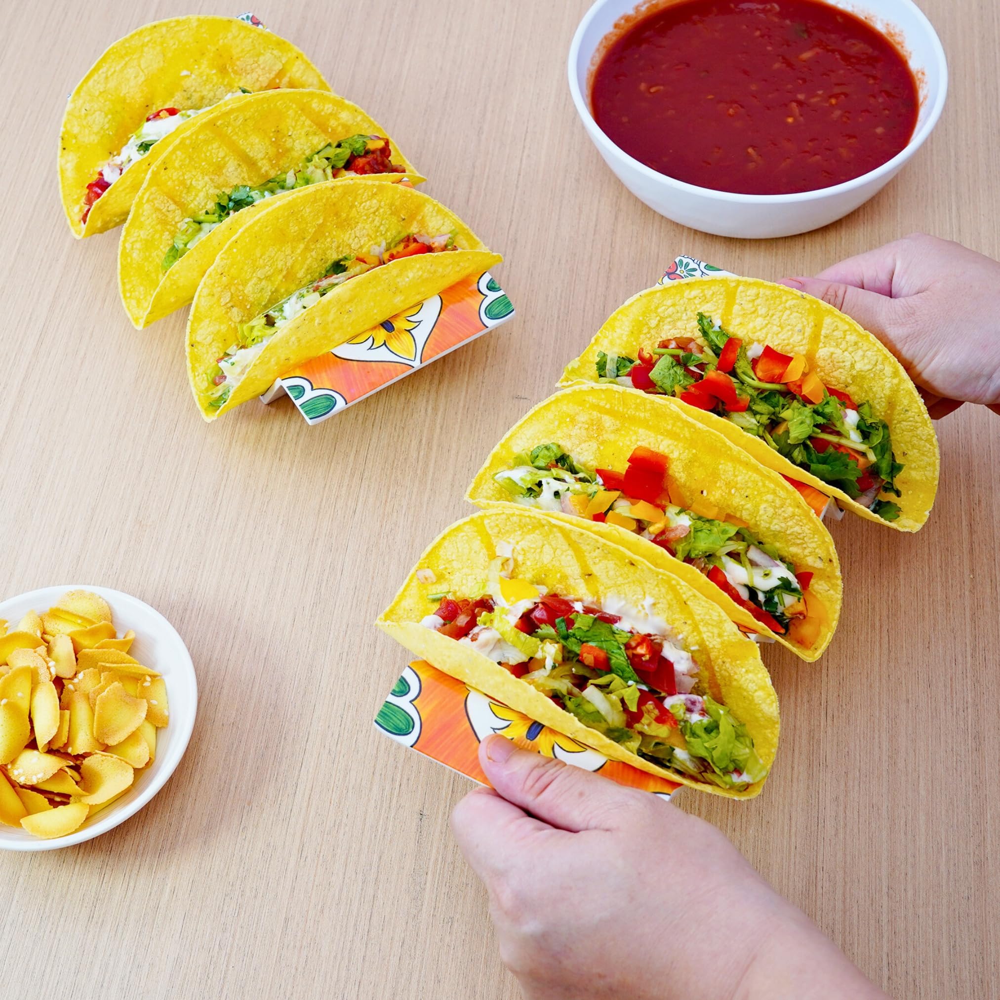 Sturdy handle helps transport TP taco stands from counter to table.