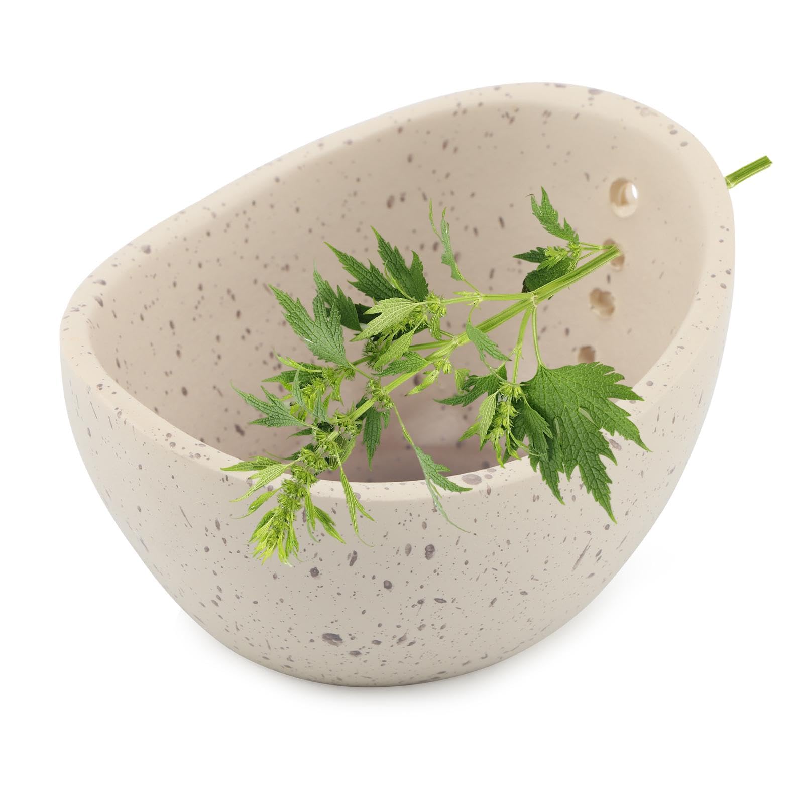 Trasylph Pottery Herb Stripper Bowl showing leaves being peeled from stems for quick prep.