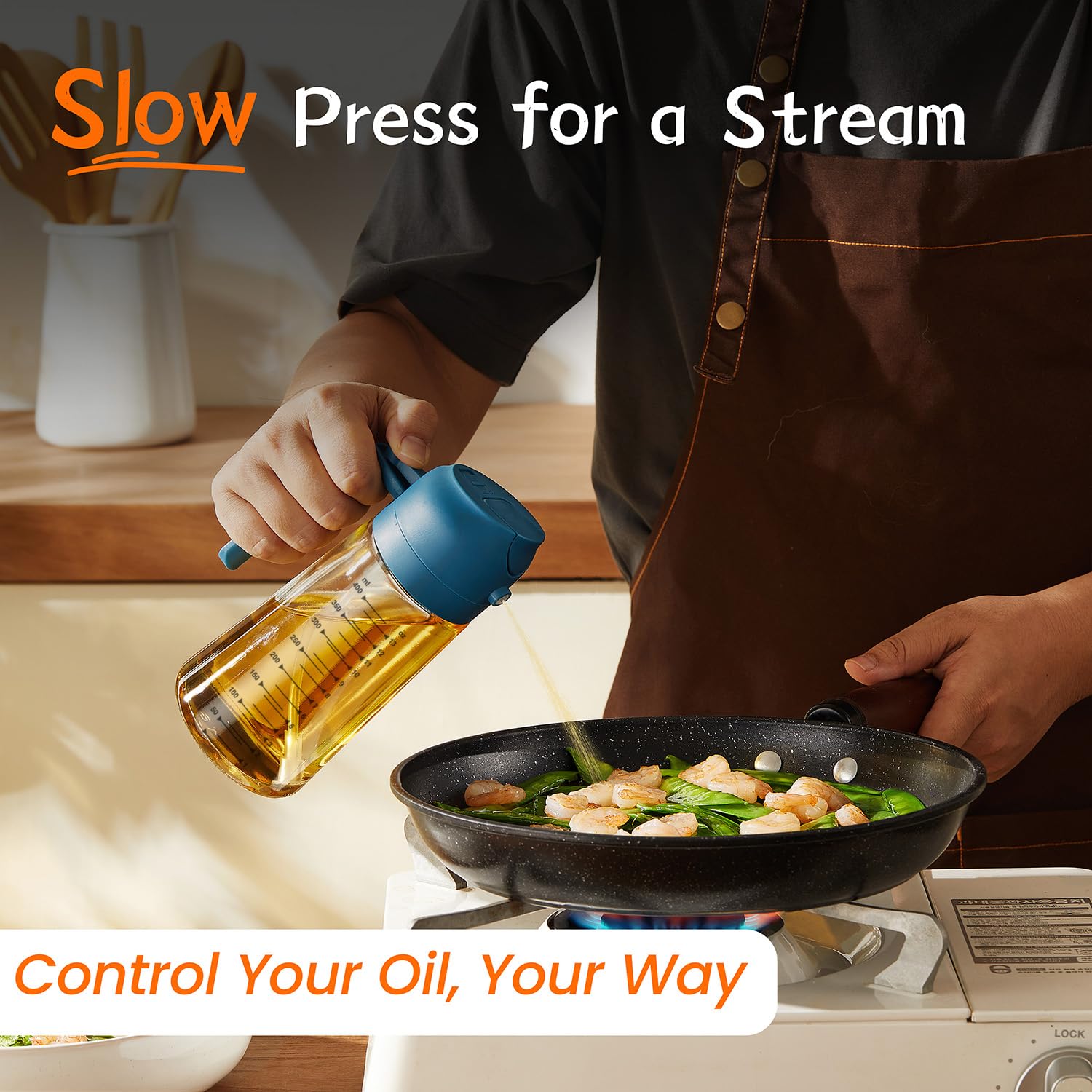 TrendPlain dual dispensing olive oil sprayer for spray and pour in one tool.
