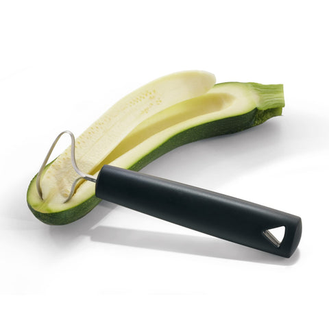 Triangle dishwasher-safe corer ready for easy cleanup after prep.