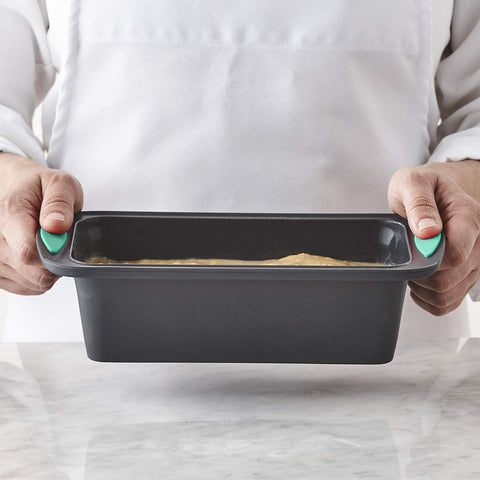 Trudeau silicone core loaf pan provides browning and secure grip.