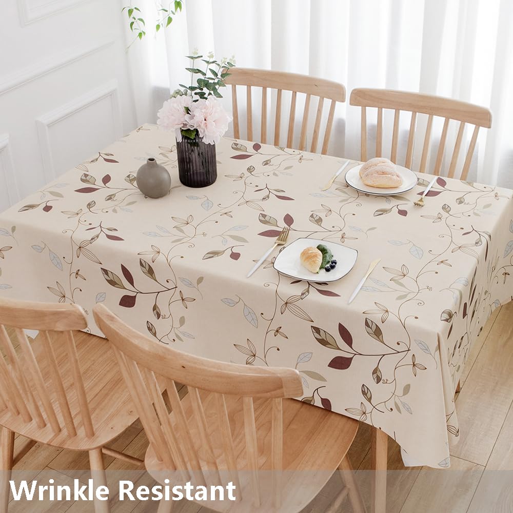 TruDelve beige tablecloth on a rectangle table for celebrations.