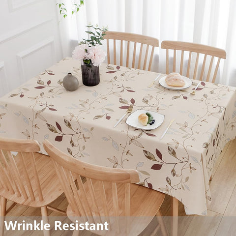 TruDelve beige tablecloth on a rectangle table for celebrations.