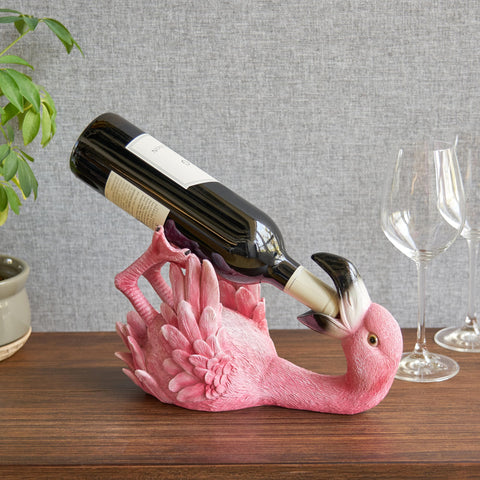 TRUE Flamingo on your kitchen counter adds whimsy as a functional wine bottle stand.