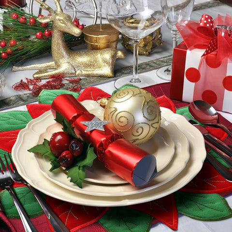 Tudomro coasters with poinsettia design protect surfaces from spills.