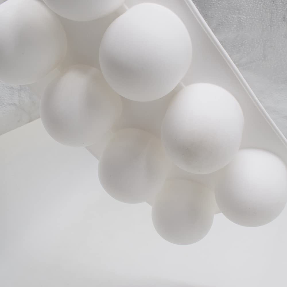 TUKE chocolate sphere mold elevates DIY dessert presentations.