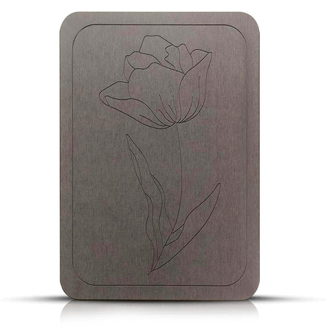 Tulvera mat close-up highlighting the engraved floral design and natural texture.