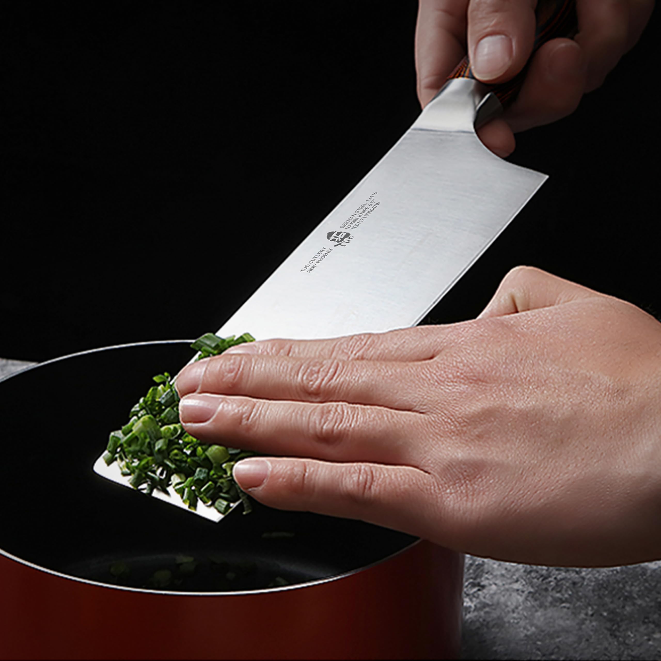 TUO Nakiri polished bolster detail for balanced handling