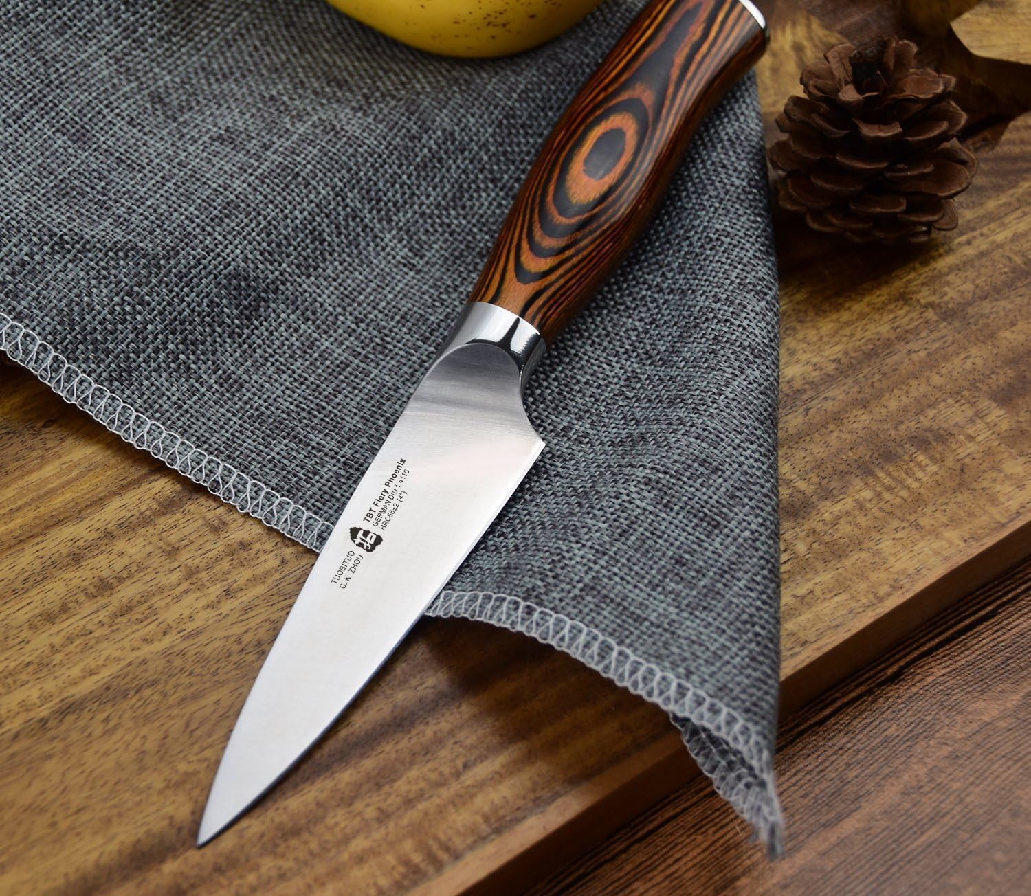 Compact TUO paring knife stored in kitchen drawer.