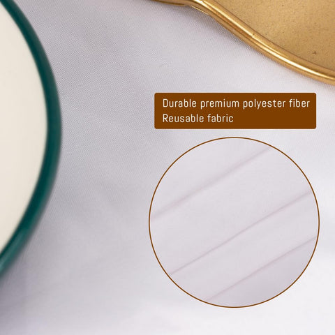 TUOTPE 120-inch round tablecloth on table for an elegant setup.