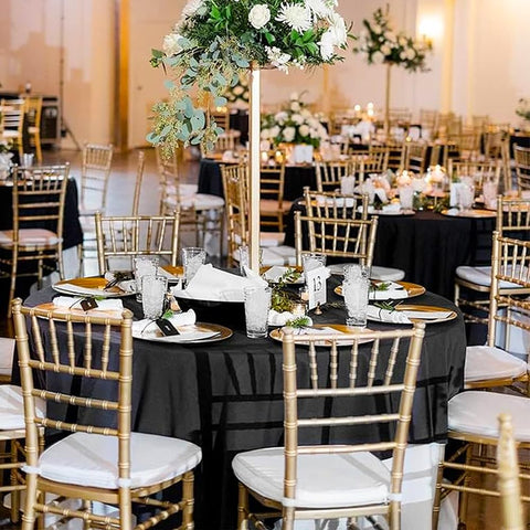 TUOTPE banquet setup with round tablecloths at event.