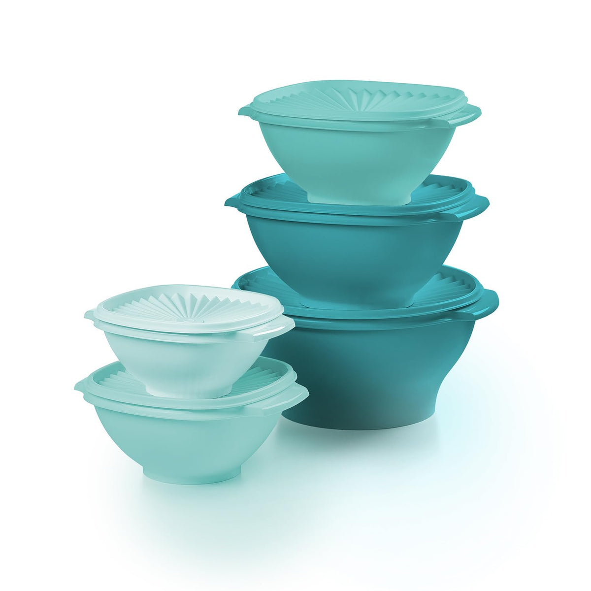 Tupperware Heritage bowls stacked in vintage green for space-saving storage.
