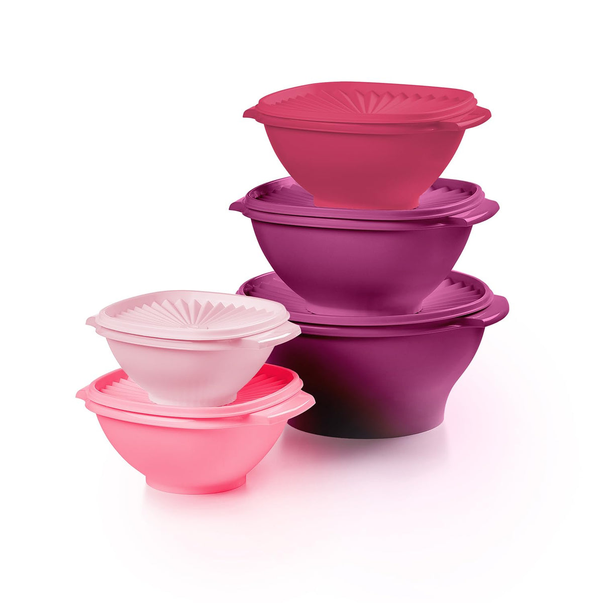 Tupperware Heritage Collection vintage pink sunburst lid bowls ready for everyday storage.