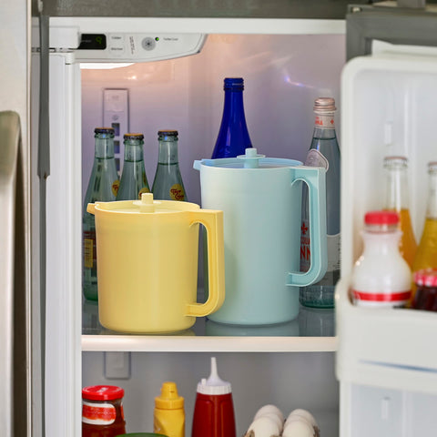 Tupperware Heritage Pitcher Aquamarine spout angled for precise pouring.