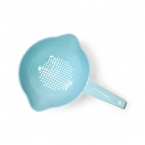 Tupperware light blue colander drains pasta and vegetables efficiently