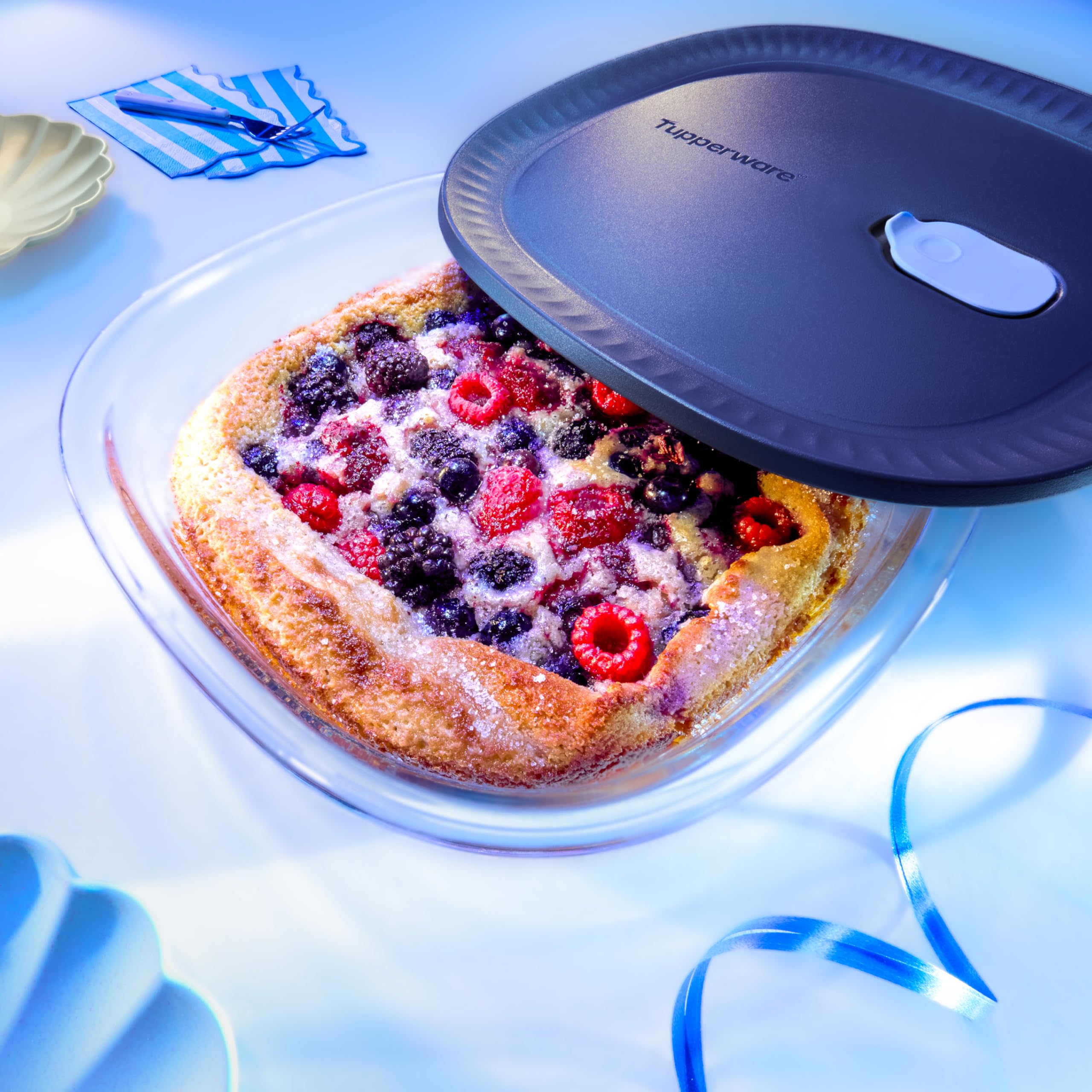 Tupperware Voila glass square baking dish, easy to clean and dishwasher-safe.
