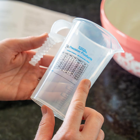 Turnah pitcher secure-handle shown for comfortable grip during pouring
